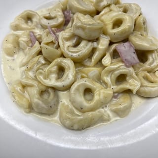 ALFREDO tortellini w/ HAM & ONIONS L